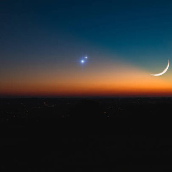 Astronomical conjunction of Saturn, Jupiter and Moon.